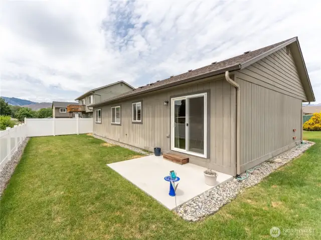 Rear patio and vinyl fencing