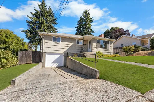 This classic home is tucked back on a private, fully fenced lot