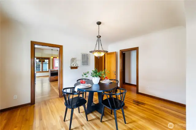 Formal dining between kitchen and formal living room.