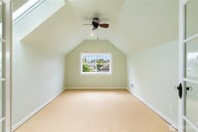 2nd floor perfect room for crafts, office or play room. Skylight adds to this room light & bright feeling. All it needs is flooring to complete this perfect space.
