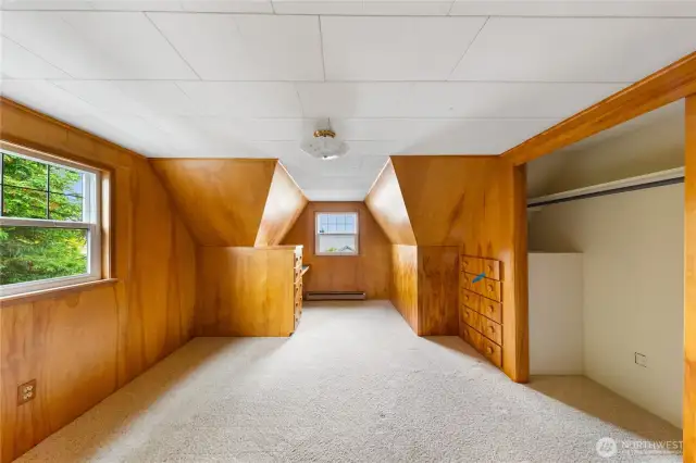 Two bedrooms on 2nd floor with the same beautiful wood work.