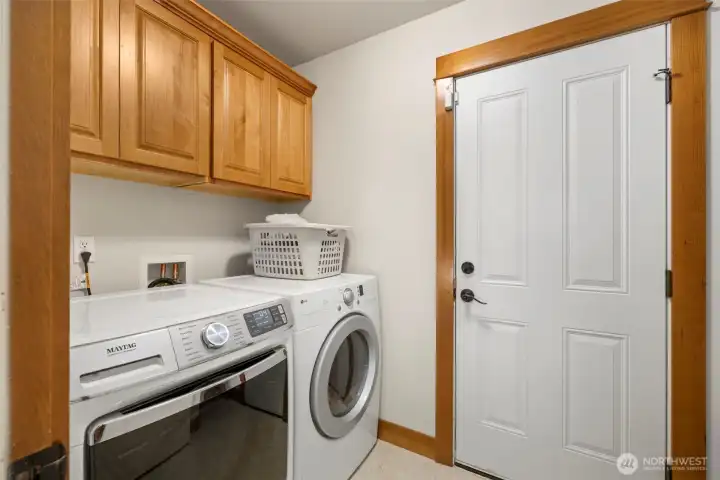 Laundry room leads to the 3 car garage!