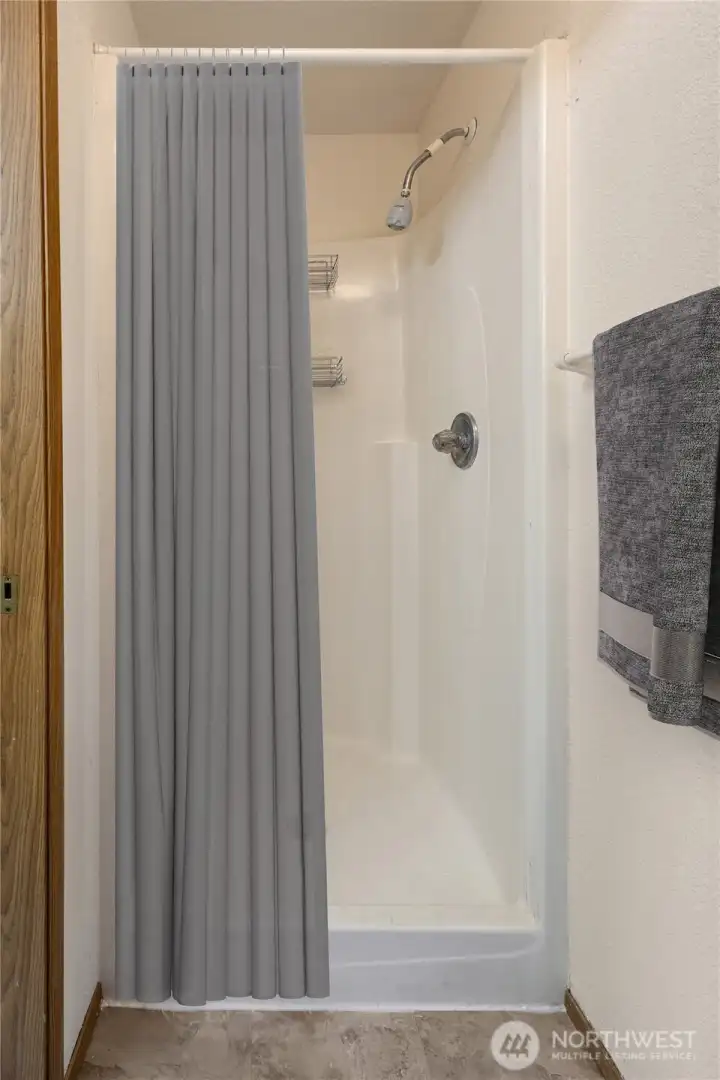 Primary Ensuite Shower  *Digitally Staged