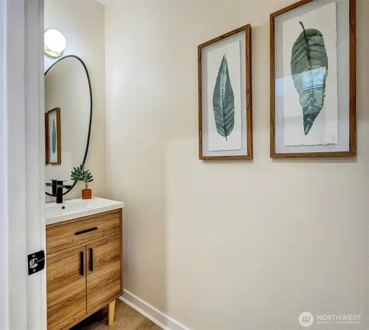 1/2 bath on the main floor off the entry hallway