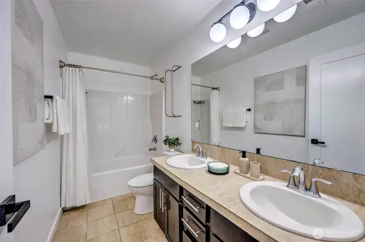 2nd floor full bathroom with double sinks & shower tub