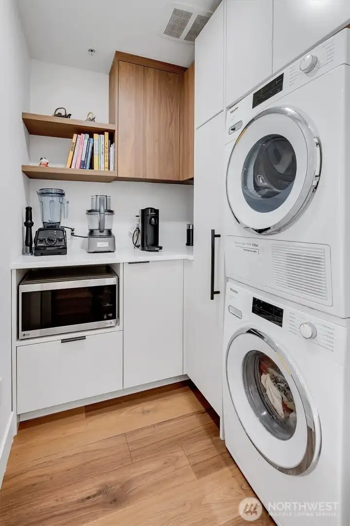 Awesome walk-in pantry with Miele Washer and Dryer