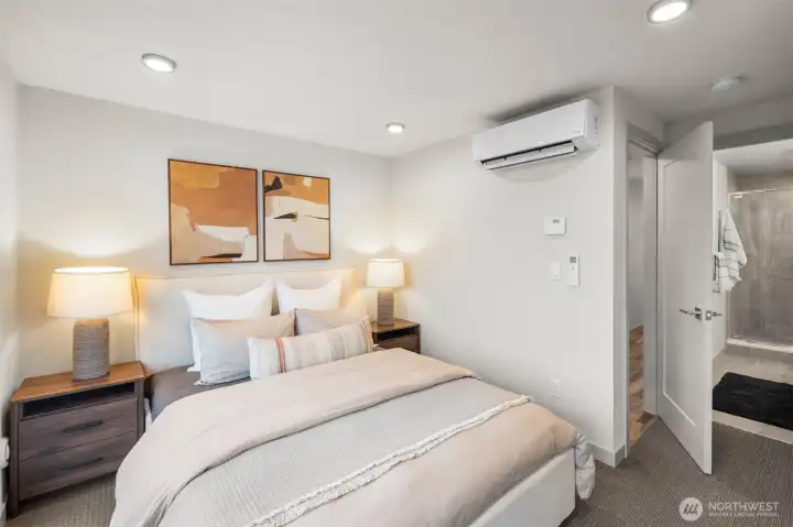 Easily accommodates a Queen bed w full nightstands