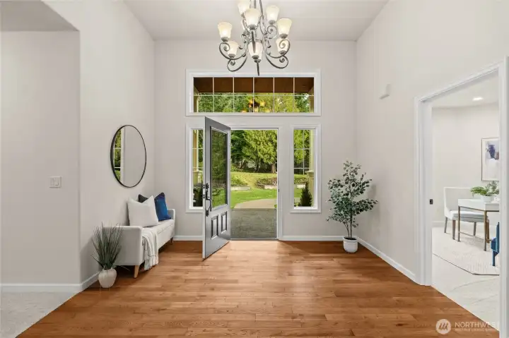 Enter your new home to this stunning, sun-drenched foyer.