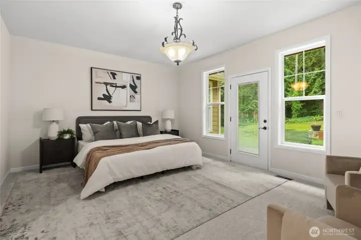 Retreat to this expansive primary suite with it's own private backyard access.