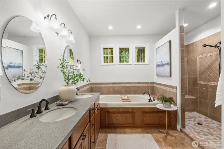 Escape into a spa-like experience in this gorgeous en suite primary bathroom.