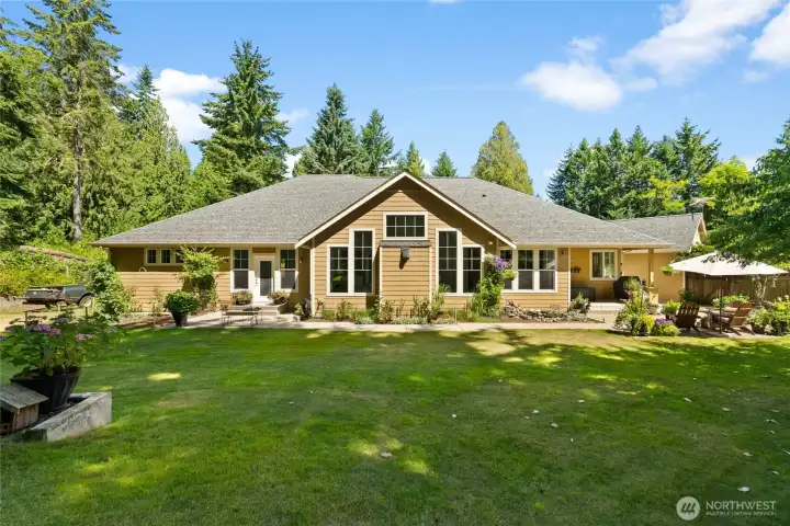 Escape to this private, serene backyard perfect for hosting, entertainment, or simply to settle in and relax.