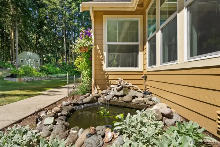 Explore the yard to find some hidden gems like this cute water feature!