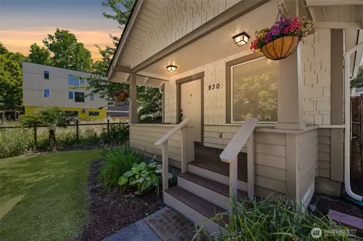 Welcoming covered front porch with new composite decking.