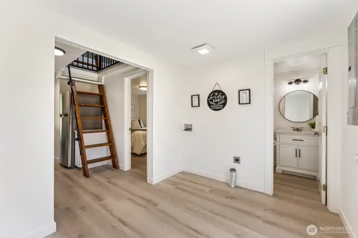 Laundry plus a little extra living space for dining room or desk.