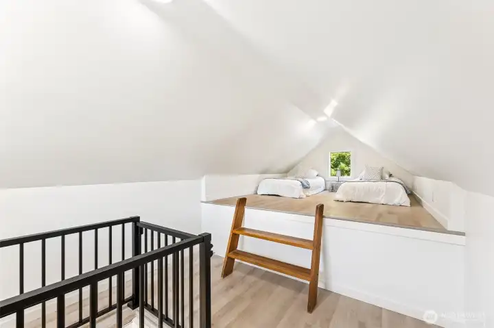 Vaulted ceilings and unique angles give this attic space character.