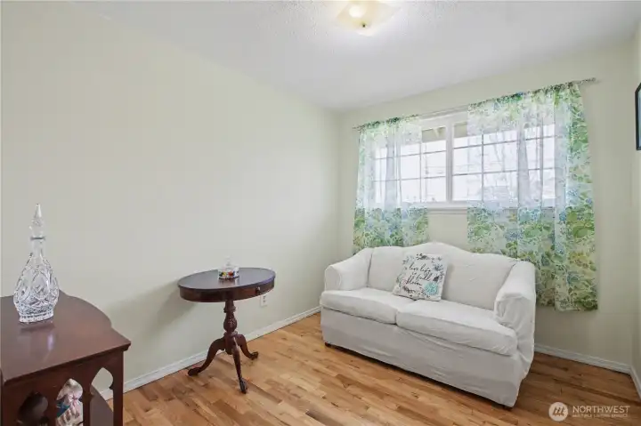 Spacious second bedroom with generous closet and versatile layout, ideal for guests, home office, or additional living space.