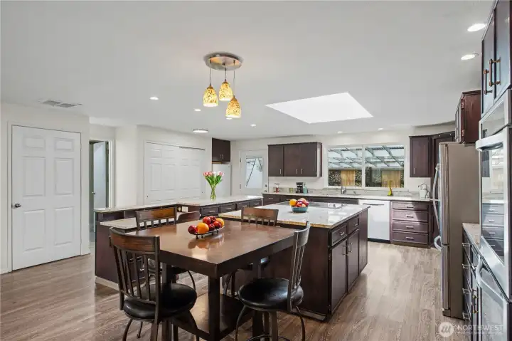 Seamless integration of kitchen and eating areas creates an ideal layout for entertaining, with generous prep space and easy flow for hosting.