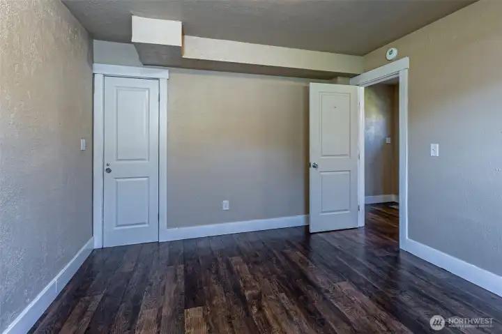 Main level bedroom and bath offers convenience for living.