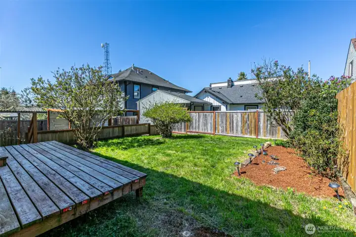 Spacious fully fenced backyard.