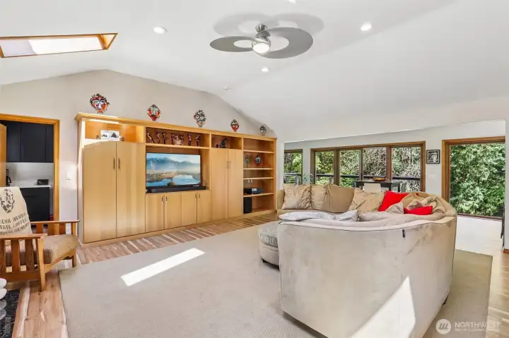 Family room w/ custom built in
