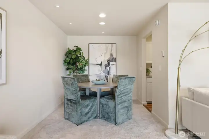 Open dining area with direct access to the kitchen.