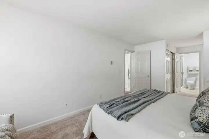Looking toward the dual closets & en-suite bath.