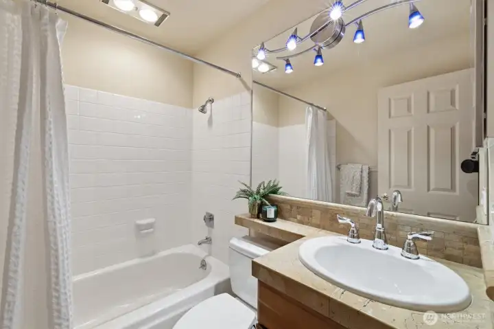Updated full bathroom off the hallway.