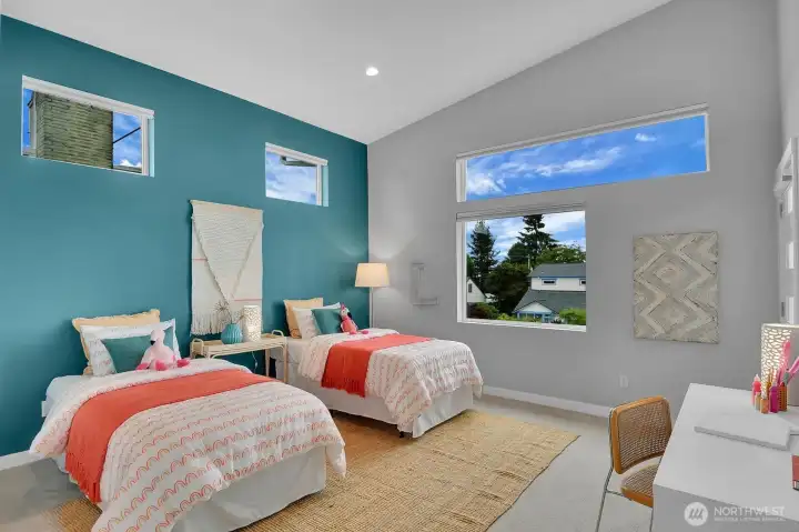 2nd upstairs bedroom with vaulted ceilings and, yes, another balcony. 2nd upstairs bedroom with vaulted ceilings and, yes, another balcony.
