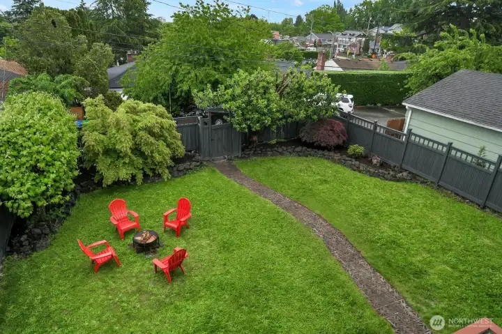 The backyard is quiet, green, fully-fenced and delightful. The backyard is quiet, green, fully-fenced and delightful.