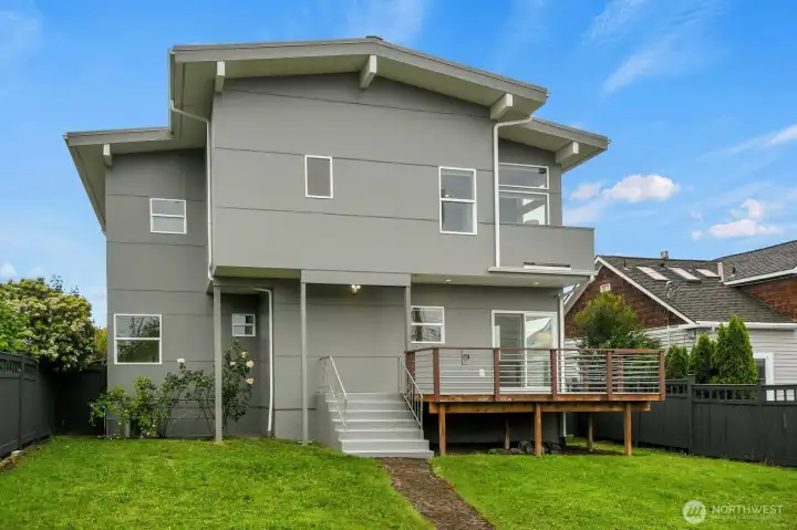 The back of the home, viewed from the alley gate. The back of the home, viewed from the alley gate.