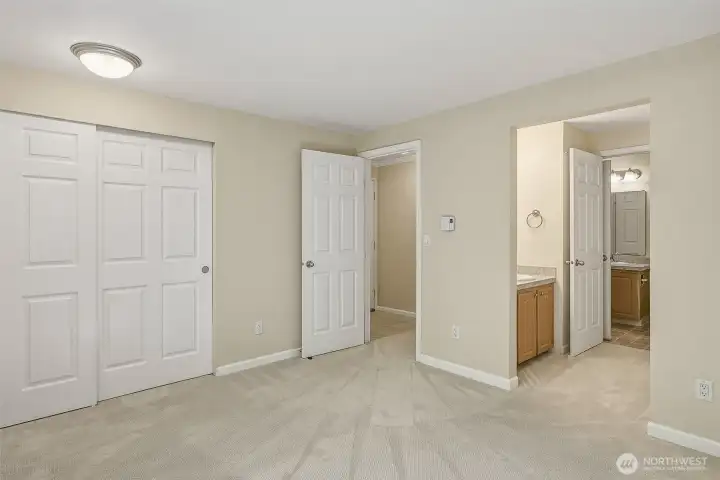 Bedroow with connected bathroom.
