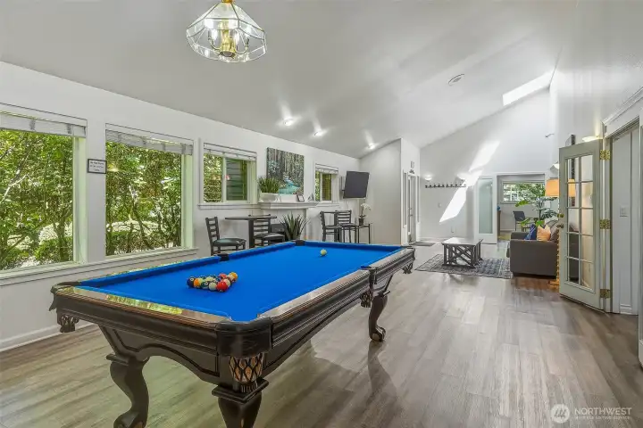 Clubhouse includes billiards, ping-pong, meeting space, exercise room, pool, and hot tub.