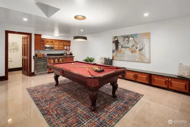 Fully finished basement has pool table & bar