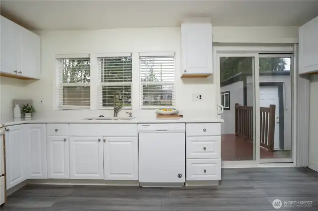 Kitchen with access to backyard deck