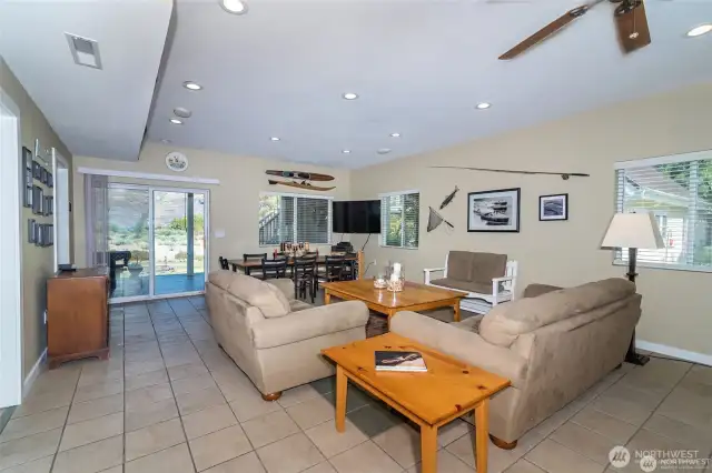Family and dining area with a front door and back yard entries. All tile floors for low maintenance.