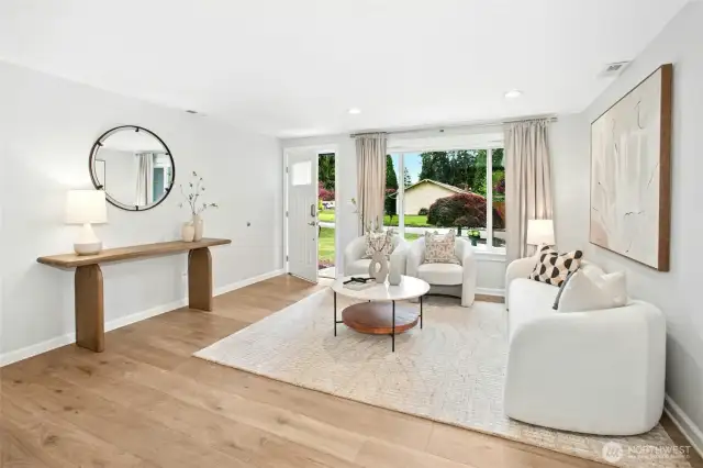 Recessed lighting and so light and bright with lots of big windows.