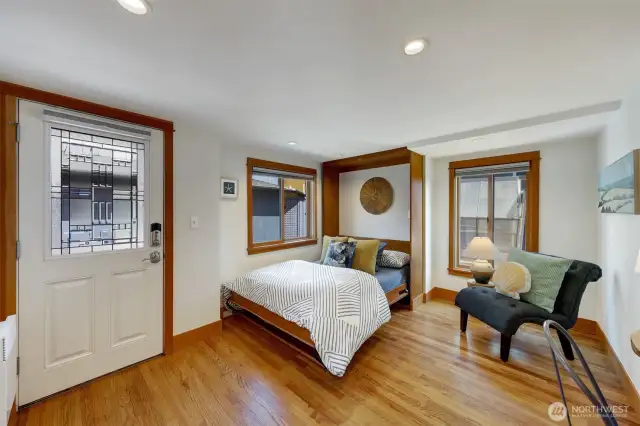 This is not the front door, but rather a side door dockside because the previous owner used to have this room set up for guests to come and go when they needed a place to rest.  There is also a door to enter the main bathroom from this room which creates a jack and jill bathroom.