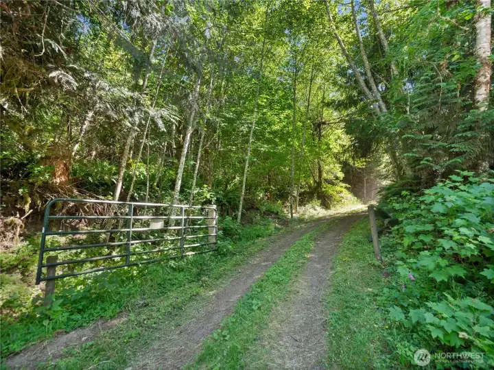 Entrance gate to lots. Photos are representative of the overall property and may not reflect the unique features of each individual lot.