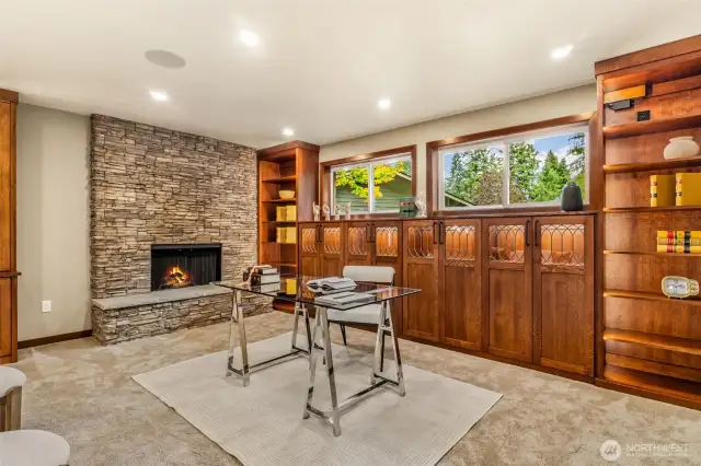 HUGE downstairs family room, 2nd wood burning fireplace.