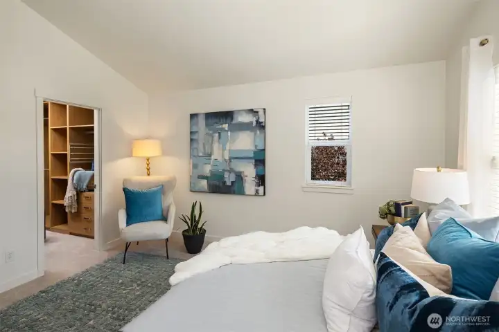 Another angle of the primary bedroom, this one showing where the primary closet is situated.