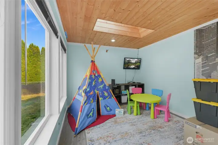 Bonus Room with a closet and wall of windows.