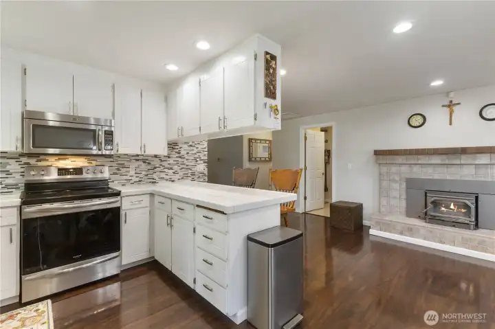 Convection oven makes cooking easy, and the tile backsplash makes cleaning easier!
