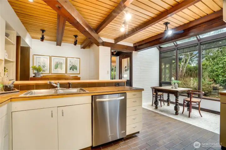 Lovely nook area in the kitchen looks over rear patio.
