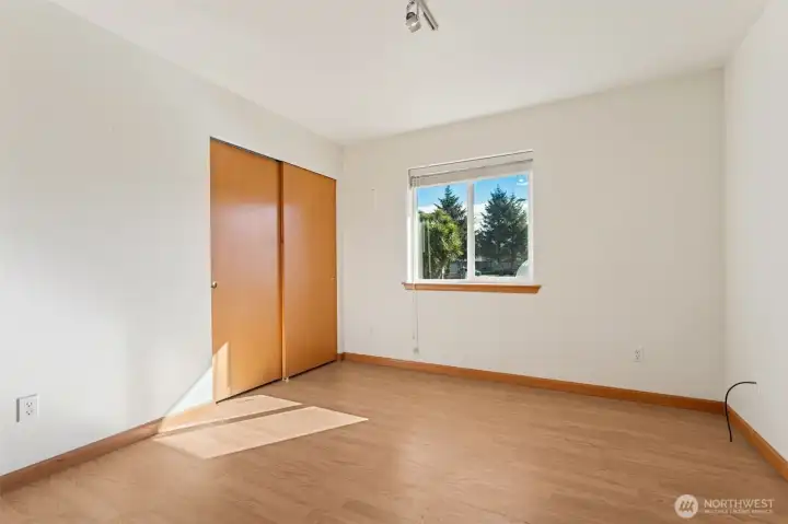 Bedroom 1 located close to main living space, could easily be used as an office or hobby room