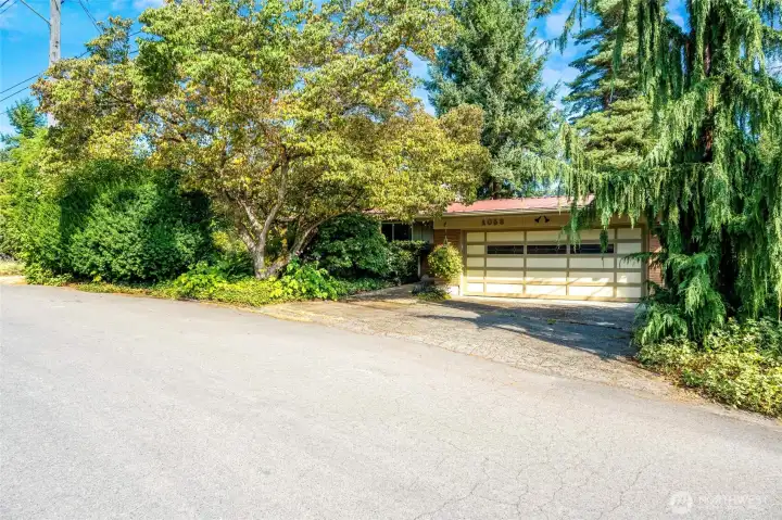 Tucked away on a private dead-end street in Seattle’s desirable Victory Heights neighborhood.