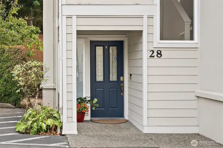 Welcome home to your level and private entry to Unit 28 in Possession Ridge!