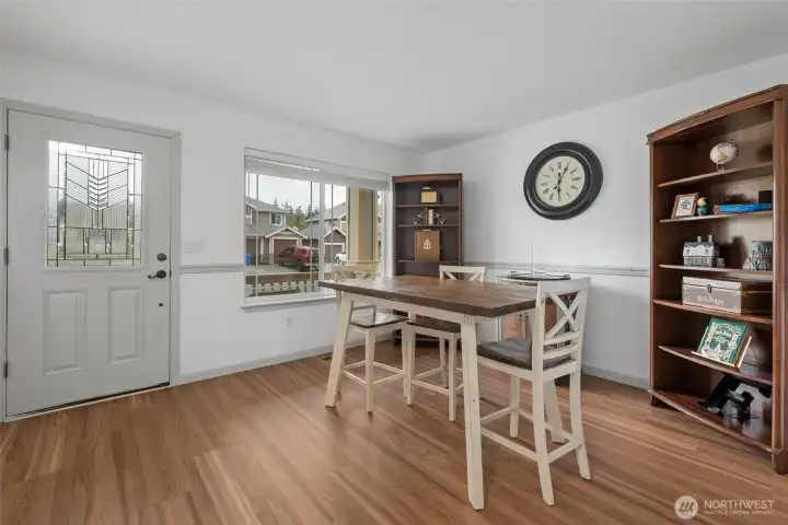 Flex room on entry with newer vinyl plank flooring