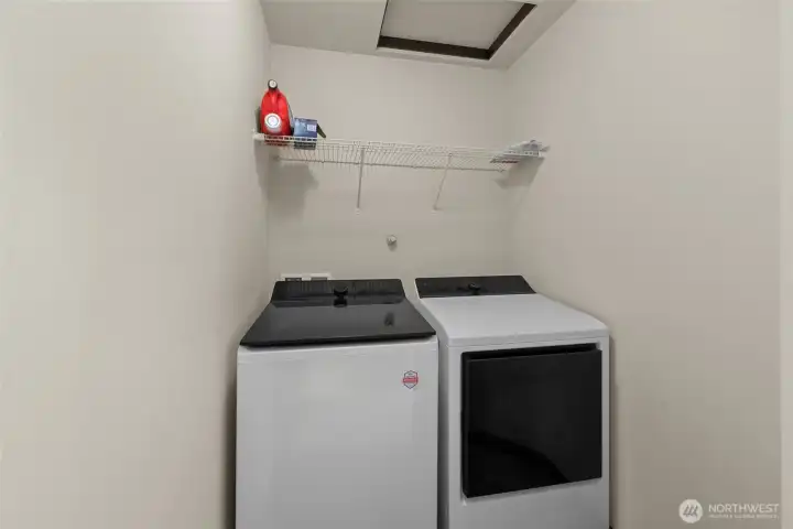 Laundry room conveniently located on upper level