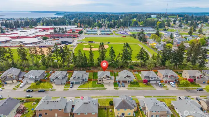 Home has sports fields behind and greenbelt buffer