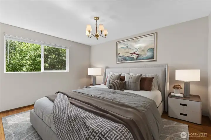 One of four spacious upstairs bedrooms featuring hardwood floors and abundant natural light. Virtually staged for inspiration One of four spacious upstairs bedrooms featuring hardwood floors and abundant natural light. Virtually staged for inspiration
